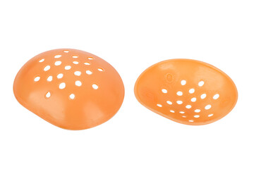 Medical Eye Shield orange color front and back side isolated on white background, Medical devices for ophthalmic patients, For prevent dust and air from entering the eyes after surgery or treatment.