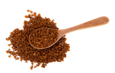 Instant coffee on wooden spoon and scatter on the ground isolated on white background. Instant...
