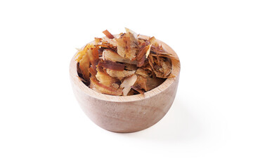 Dried Bonito Flakes (Katsuobushi) isolated on white background. Katsuobushi is made from bonito flakes that have been smoked and hard dried, To be shavings into a thin sheet for Japanese soup stock.