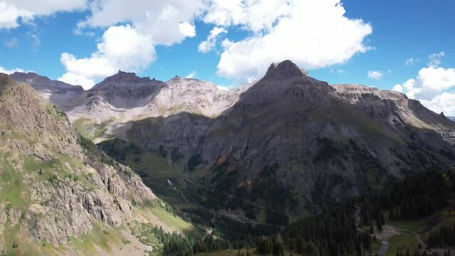 Governor Basin near Ouray, Colorado with Sneffels Mining District in the distance. Aerial 4K drone video in the Rocky Mountains.
