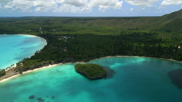 Aerial view of Kanumera, Kuto Bays, Isle of Pines. Push in towards Sacred Rock.