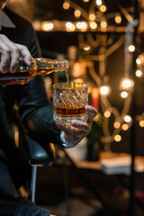 Celebrate whiskey a friendly party in restaurant.