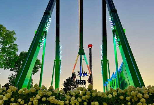 NPE Pleasure and leisure park for children and adults swings attractions Evening lights on swing Scary creepy swing in park Playland is an amusement park in British Columbia Canada Vancouver 09.2022