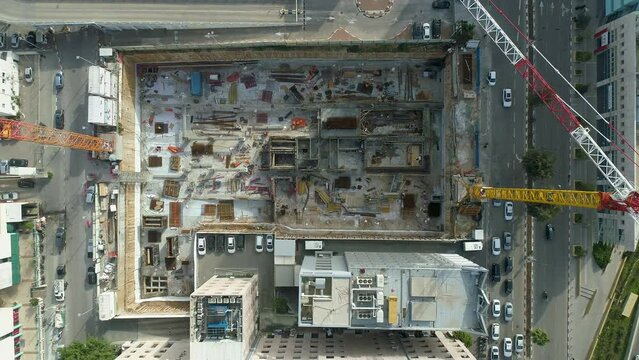 Overhead View Of Construction Site With Industrial Tower Crane. - aerial