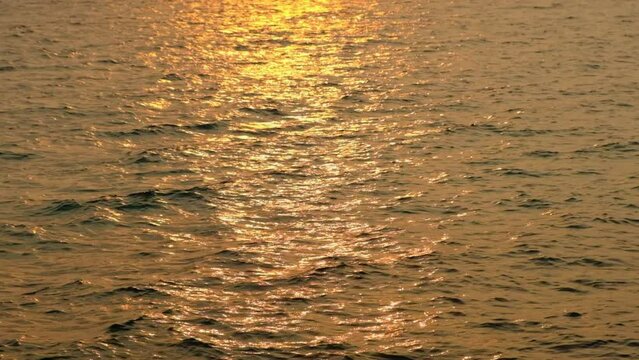Vdo 4k slow motion of sea water and waves at sunset The magic of tropical waters and paradise beaches in the Andaman Sea.
