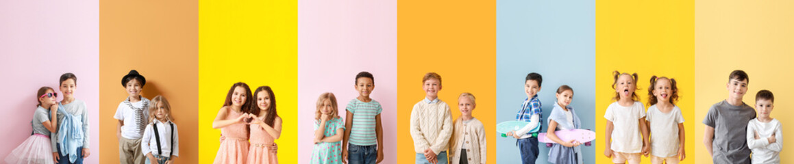 Group of cute little children on color background