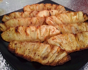 Baked pineapple smothered in honey.