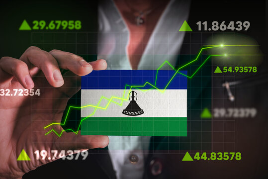 Graph growing up in Front Of Lesotho Flag. business state growing up concept.
- Powered by Adobe