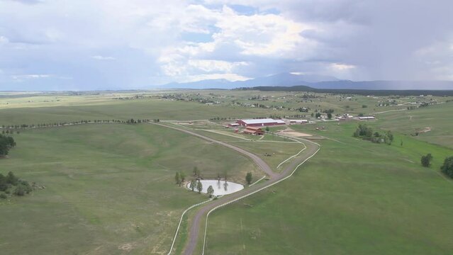 Black Forest Plains near in Colorado, with Thunderstorm in the distance, near Flying Horse Ranch. Aerial 4K drone video 