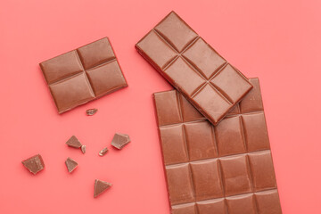 Sweet chocolate on red background
