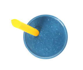 Glass of tasty blue smoothie with straw on white background