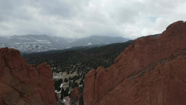 Snow Covered Garden of the Gods, Winter/Fall, natural rock Formation, 8th Wonder of the World. 4K aerial video, located in Colorado Springs, Colorado, USA. 