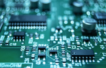 Closeup of Printed Circuit Board with processor, integrated circuits and many other surface mounted passive electrical components. - obrazy, fototapety, plakaty