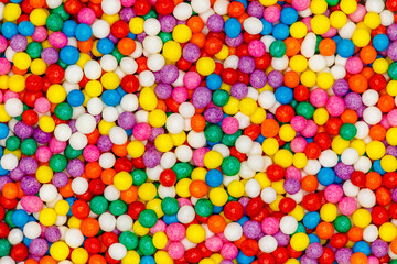 Fototapeta na wymiar Sprinkling close-up for confectionery multi-colored sweet balls, background