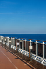 Outdoor jogging running walking track on deck of luxury cruiseship cruise ship liner with ocean...
