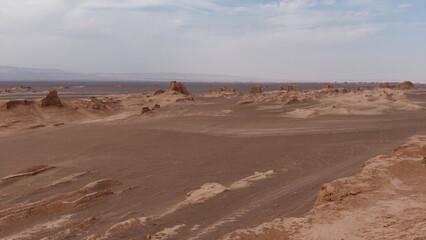 Peaceful view of the beautiful Dasht-e Lut Desert and its rock formations (Kaluts), Kerman Province, Iran	