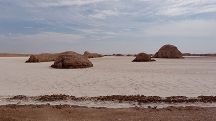 Fototapeta na wymiar View of the white salt on the surface of the Lut desert, Kerman Province, Iran