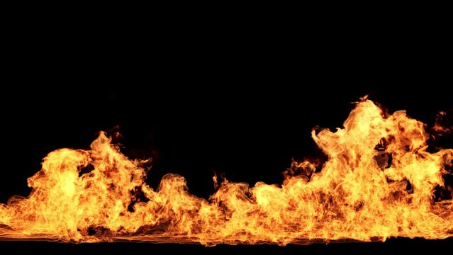 A blazing bright wildfire on ground surface on black background in a seamless loop. Looped animation of fire flame overlay.