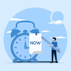 timekeeping concept, businessman with pencil after he wrote the word Now on a note and stuck it on a ringing alarm clock. Stop procrastinating, do it now to finish work or appointments on time.