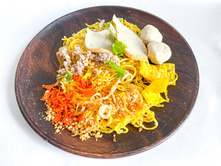 Yellow dried noodles Thai food style on white background