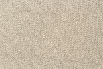 Fototapeta na wymiar Brown cotton fabric cloth texture for background, natural textile pattern.