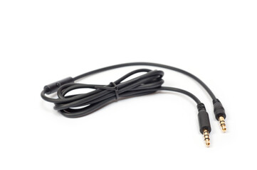 Black cord with a mini jack for connecting various gadgets, shot on a white background.