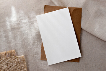 Classic minimalist business brand template, blank paper card and envelope on neutral beige...