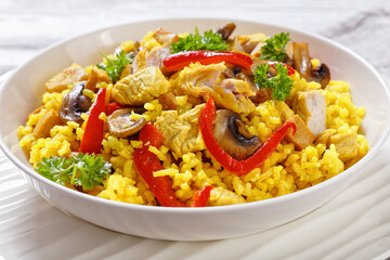 Chicken Paella with mushrooms, red pepper, spices