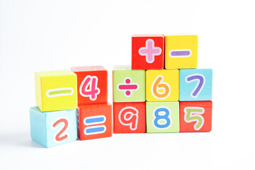 Number wood block cubes for learning Mathematic, education math concept.