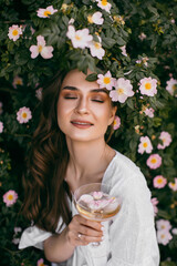 Picnic on nature. Young woman having picnic with champagne 