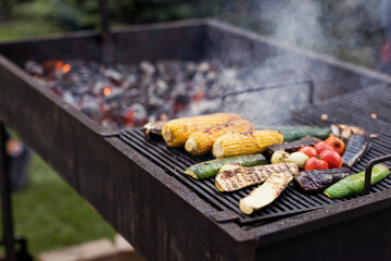 Vegetables on grill barbecue outdoors