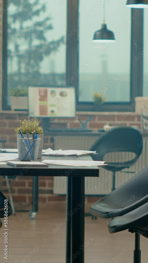 Aufkleber vertical video: boardroom table in empty business office, agency coworking space filled with compute
