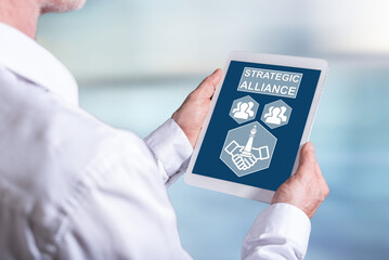 Strategic alliance concept on a tablet