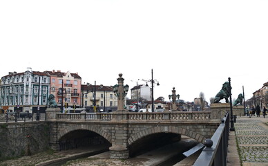 A panoramic view of the Lion Bridge from 1889 with lion sculptures, ancient buildings, a crossroad,...