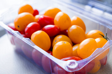 fresh cherry tomatoes different colors close up