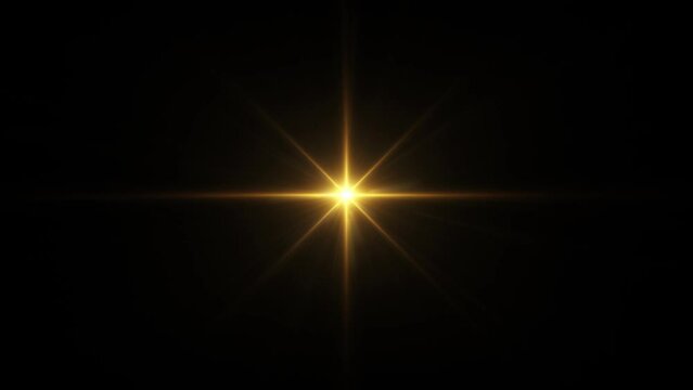 Loop center glow gold orange star lights optical lens flares shine animation on black abstract background. Lighting lamp rays effect dynamic bright video footage. 