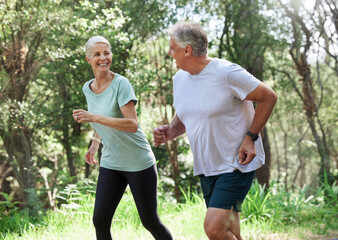 Senior couple, exercise and happy outdoor for run, workout and training for fitness. Old man and woman in forest for cardio health, motivation and wellness in retirement while running in nature