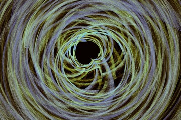 Green purple swirling pattern of crooked waves with a small heart on a black background. Abstract fractal 3D rendering