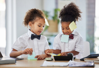 Children, together and playing office with sticky note at desk with happiness, brainstorming and teamwork. Kids, girl and group with paper, planning and play as business people for bond with games