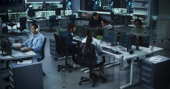 Group of Multicultural South Asian Men and Women Working in a Research Center, Collaborating and Discussing a Project, Using Computers to Write Software Code, Develop Artificial Intelligence Service