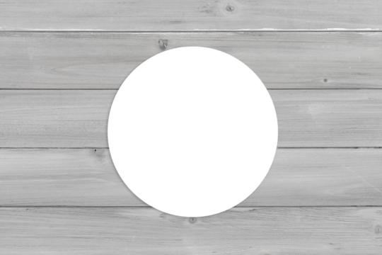 Round Sticker Mockup on Gray Wooden Surface
