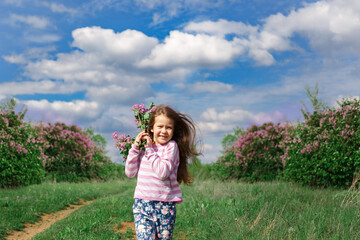 a little girl in a lilac bush, a girl near a flowering bush, lilacs in spring, bushes bloom

