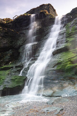 Waterfall onto Tintagel Haven Beach in North Cornwall, England