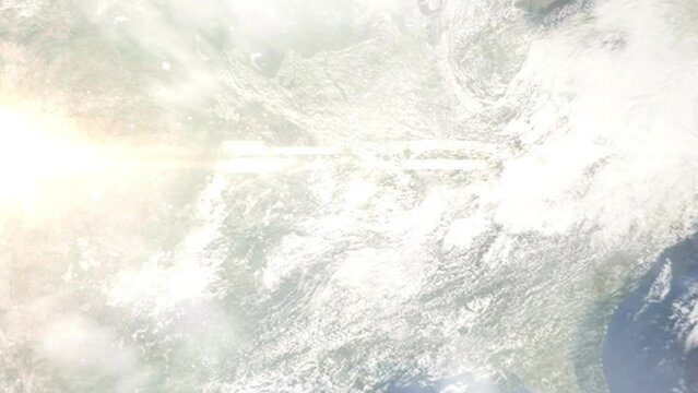 Earth zoom in from outer space to city. Zooming on Paragould, Arkansas, USA. The animation continues by zoom out through clouds and atmosphere into space. Images from NASA