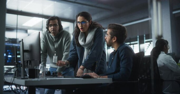 Team of Three Diverse South Asian Software Developers Talk, Discuss a Technological Project. Empowered Indian Female Specialists and Two Colleagues Work on Digital Software as a Service Business