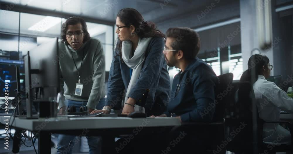 Aufkleber Team of Three Talented Young Software Engineers Use Computer to Discuss a Technological Project in Modern Industrial Office. Group of Male and Female Scientists Work in Research and Development Center