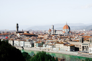 Fototapeta na wymiar Beautiful panorama of old town and Arno river in Florence, stock photo