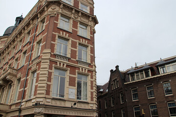 Fototapeta na wymiar old brick building (hotel) in amsterdam (the netherlands) 