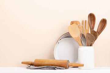 Kitchen utensils on wooden table