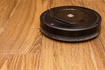Robot vacuum cleaner, robot vacuum cleaner wipes floors, power button is on and ready to work